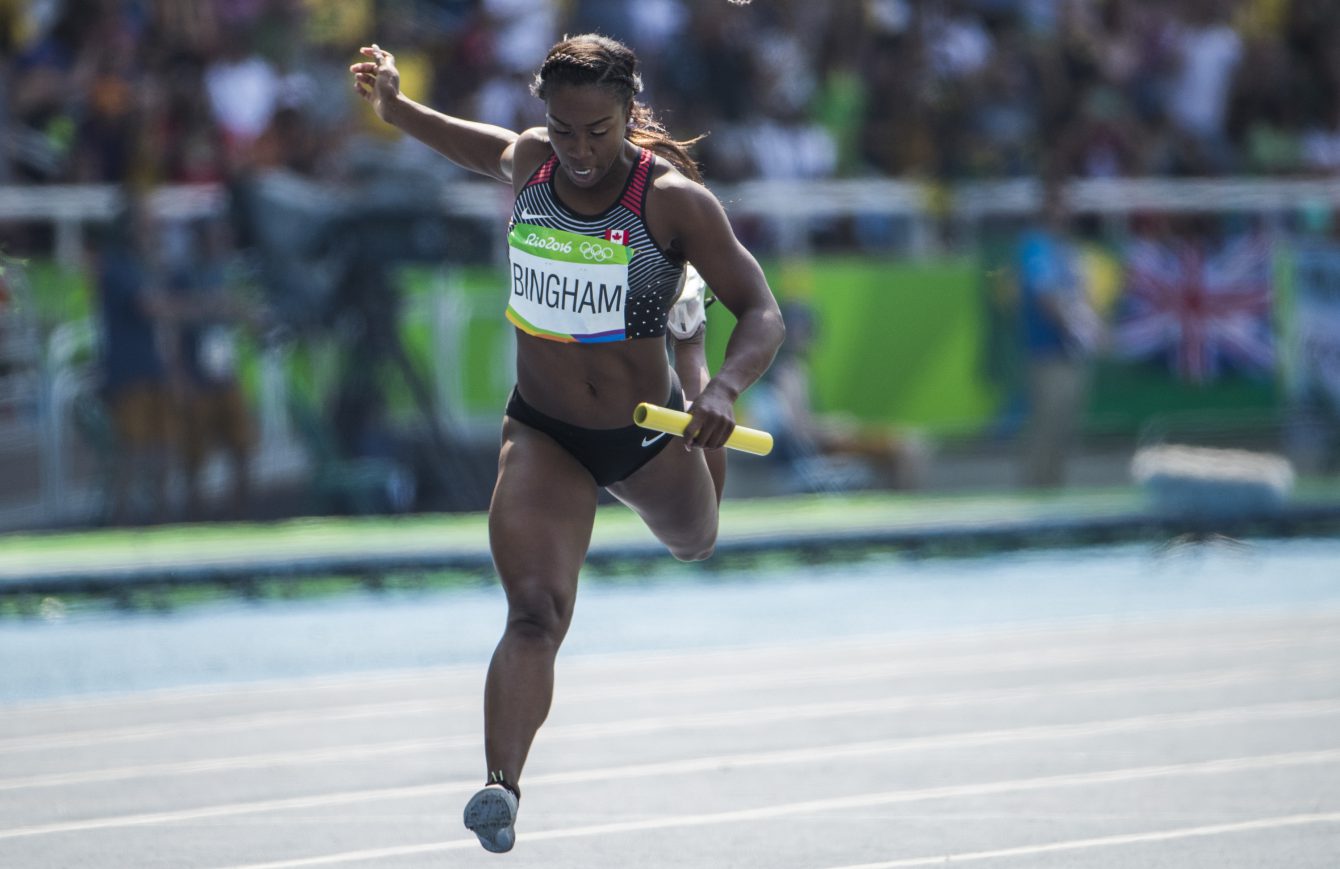 Khamica Bingham competes in Round 1 -Heat 1 of the Women's 4x100m Relay at the Olympic Games in Rio de Janeiro, Brazil, Thursday, August 18, 2016. COC Photo by Stephen Hosier