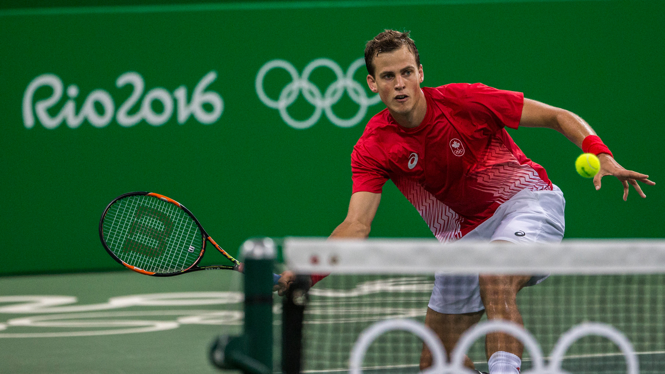 Canada's Vasek Pospisil returns a shot in men's doubles action at Rio 2016 on August 8, 2016. (David Jackson/COC)