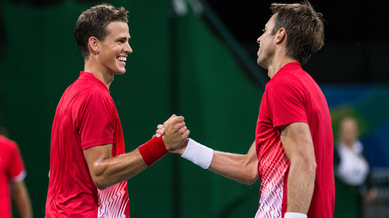 Vasek Pospisil (left) and Daniel Nestor celebrate in men's doubles at Rio 2016 on August 8, 2016. (David Jackson/COC)