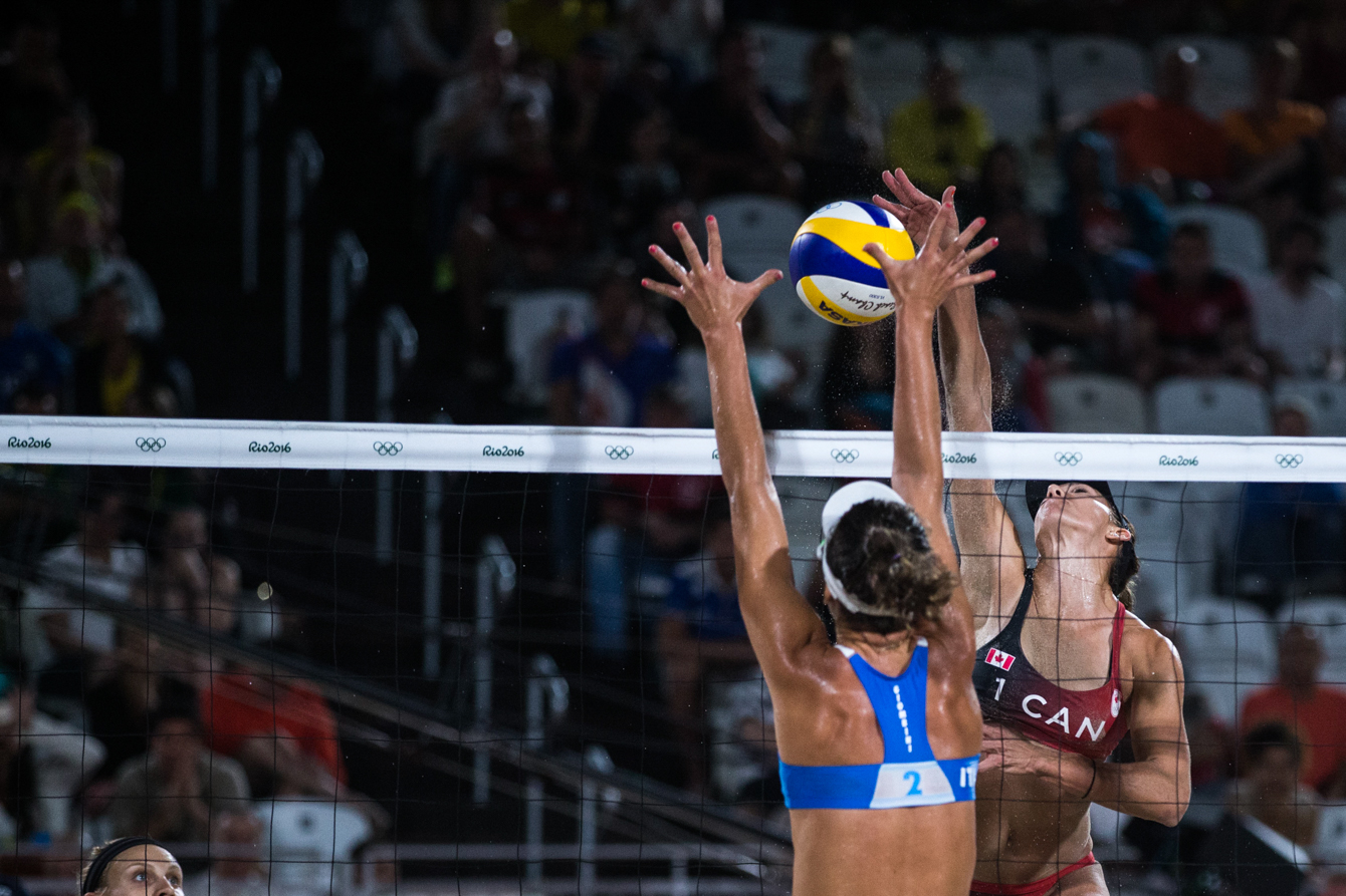 Team Canada's women's beach volleyball duo, Kristina Valjas and Jamie Broder, battle in a preliminary match against Italy, Copacabana Beach, Rio de Janeiro, Brazil, Sunday August 7, 2016. COC Photo/David Jackson