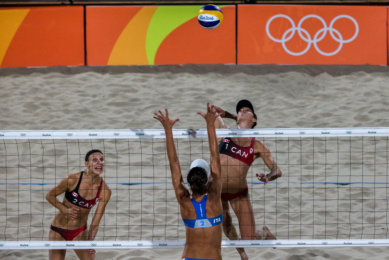 Team Canada's women's beach volleyball duo, Kristina Valjas and Jamie Broder, battle in a preliminary match against Italy, Copacabana Beach, Rio de Janeiro, Brazil, Sunday August 7, 2016. COC Photo/David Jackson