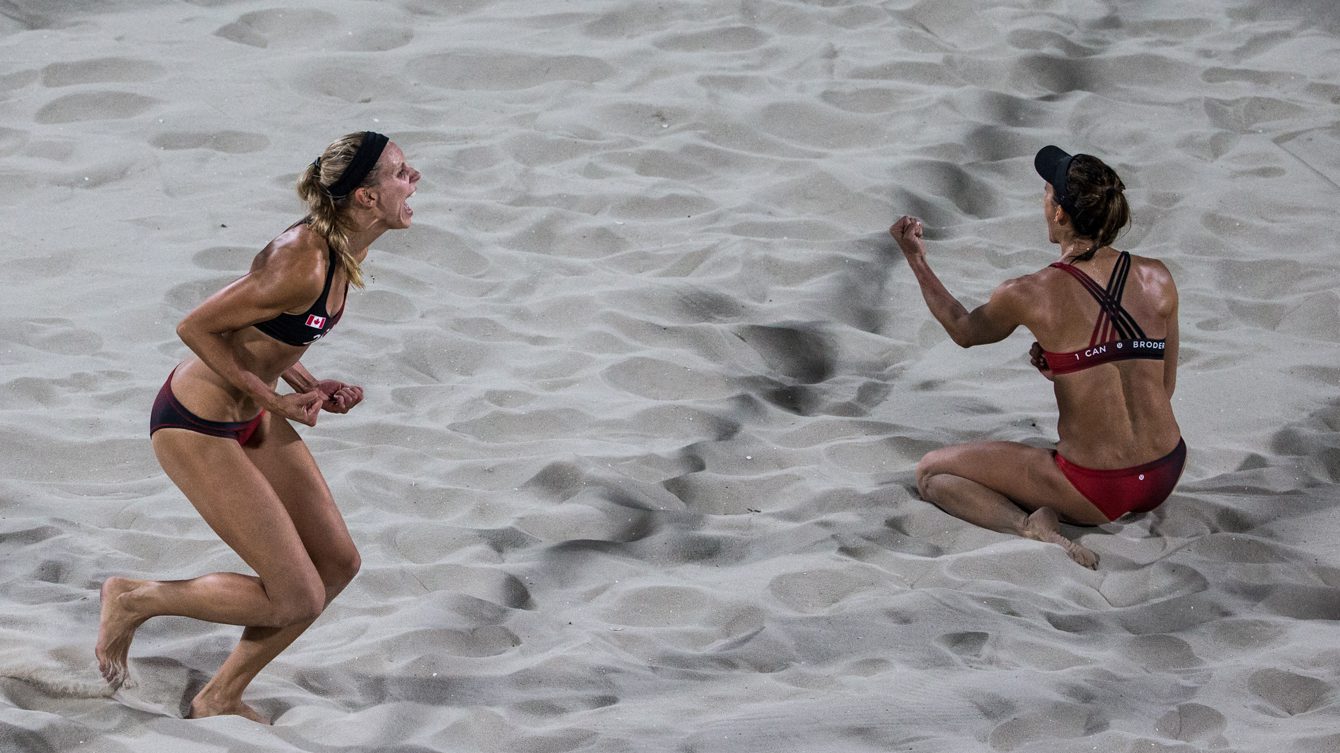 Team Canada's women's beach volleyball duo, Kristina Valjas and Jamie Broder, battle in a preliminary match against Italy, Copacabana Beach, Rio de Janeiro, Brazil, Sunday August 7, 2016. COC Photo/David Jackson