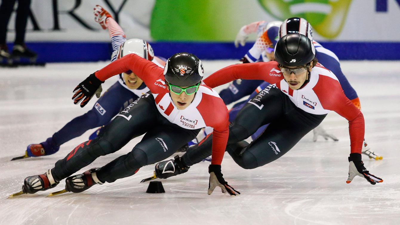 Charle Cournoyer and Samuel Girard compete in the 1000m at the World Cup in Calgary on Nov. 6. ( Photo: THE CANADIAN PRESS/Jeff McIntosh)