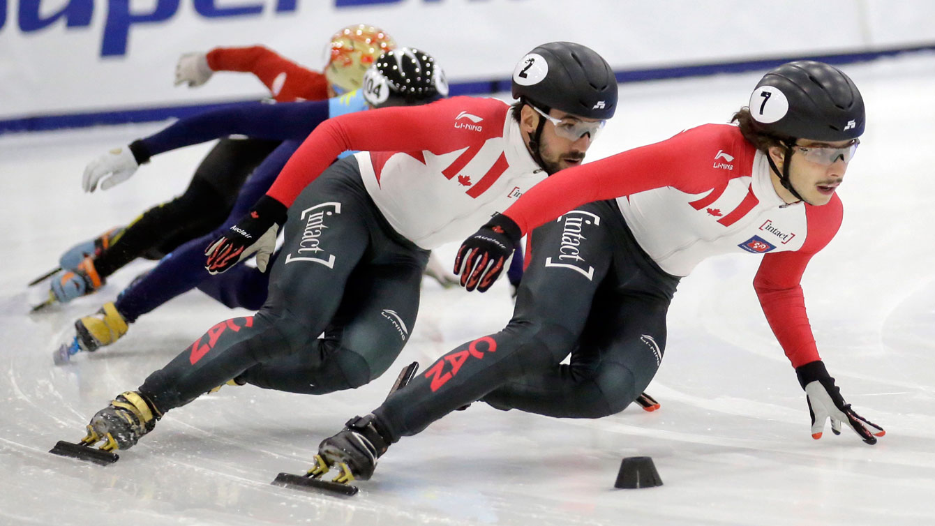 Samuel Girard and Charles Hamelin race during the men's 500 at a World Cup event in Utah on Nov. 13, 2016. (AP Photo/Rick Bowmer)