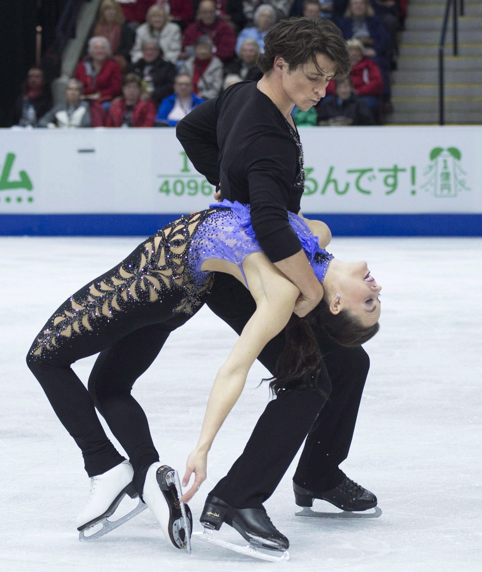 Tessa Virtue and Scott Moir of Canada perform in the ice dance short program during the 2016 Skate Canada International competition in Mississauga, Ont., on Friday, October 28, 2016. THE CANADIAN PRESS/Nathan Denette