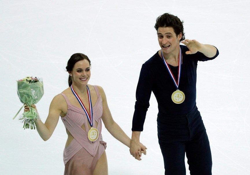 Tessa Virtue Scott Moir GPF Tessa Virtue and Scott Moir of Canada celebrate their gold medals after winning the Ice Dance Program during ISU Grand Prix of Figure Skating Final in Marseille, southern France, Saturday, Dec. 10, 2016. (AP Photo/Christophe Ena)