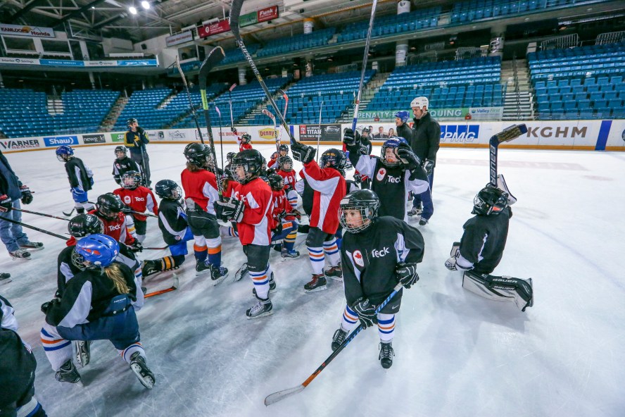 Young players celebrate a fun day at the Teck Coaching Series in Kamloops, BC on December 3, 2016 Photo: Allen Douglas