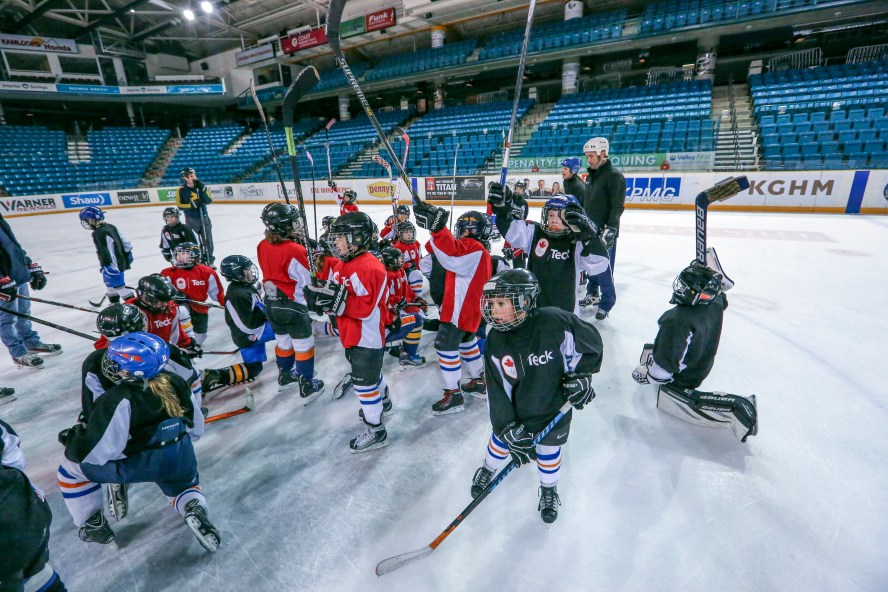 teck-olympic-hockey-olympic-hockey_5811 Young players celebrate a fun day at the Teck Coaching Series in Kamloops, BC on December 3, 2016 Photo: Allen Douglas