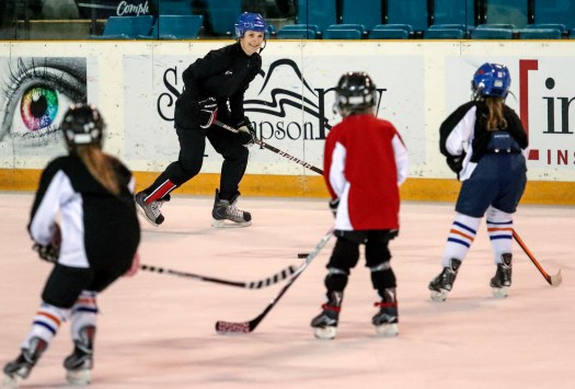 Jennifer Botterill coaches nine-year-old participants at the Teck Coaching Series in Kamloops, BC on December 3, 2016. (photo: Allen Douglas)