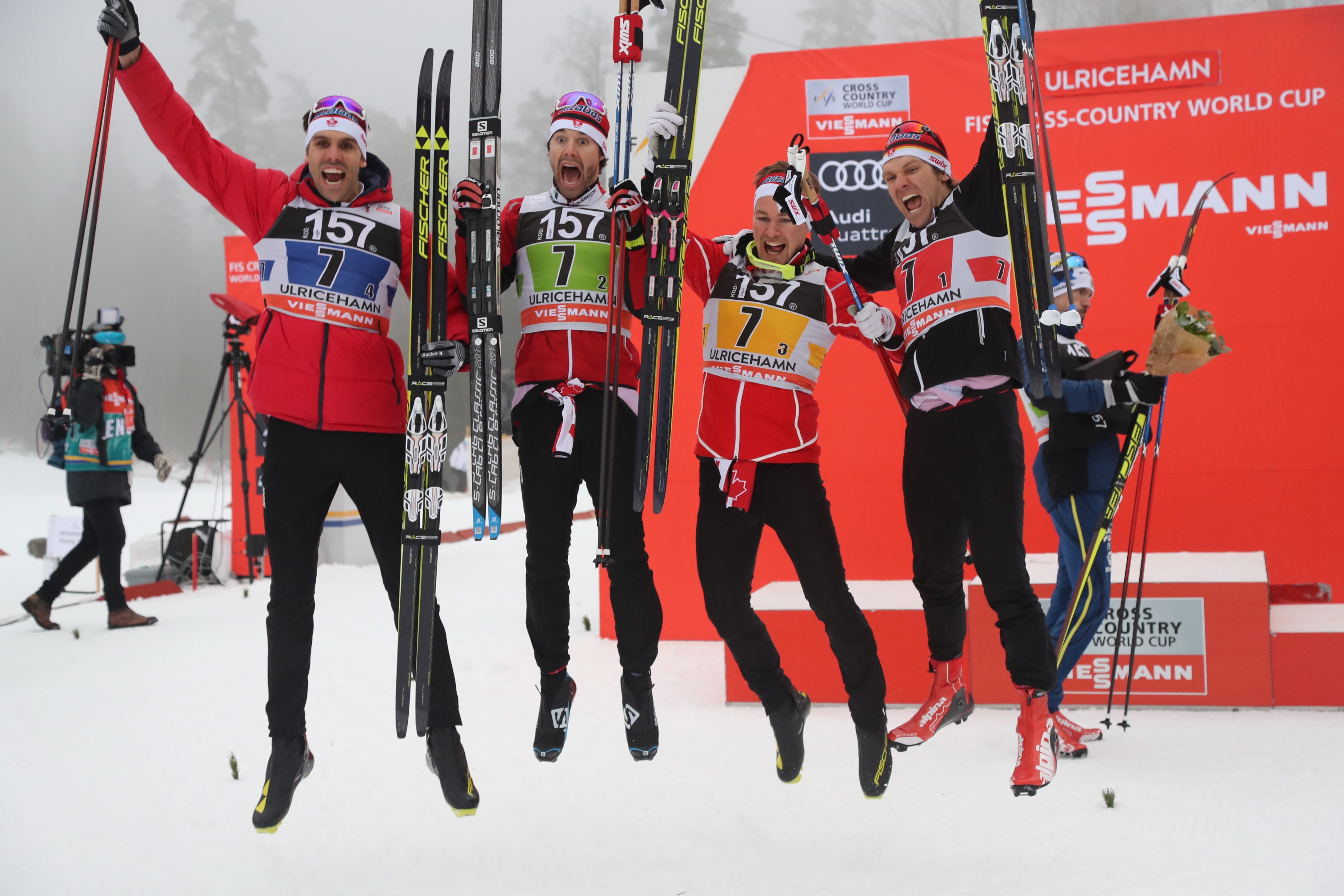 Team of Canada, from left, Len Valjas, Alex Harvey, Knute Johnsgaard and Devon Kershaw celebrate their third place in men's relay 4x7.5 km competition at the FIS Cross Country skiing World Cup event in Ulricehamn, Sweden, Sunday Jan. 22, 2017. (Adam Ihse / TT via AP)