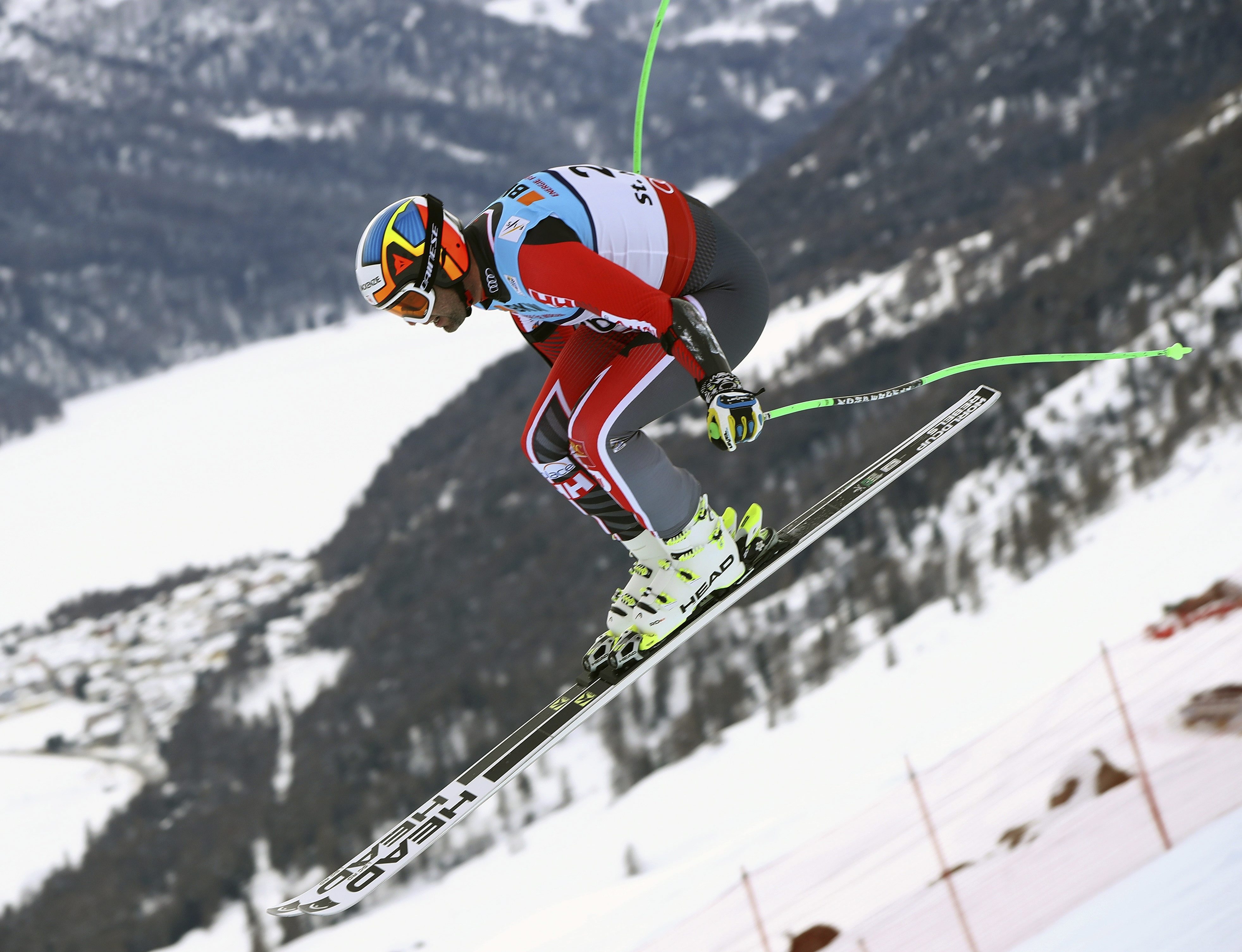 Canada's Manuel Osborne Paradis is airborne during a men's super-G, at the alpine ski World Championships, in St. Moritz, Switzerland, Wednesday, Feb. 8, 2017. (AP Photo/Alessandro Trovati)