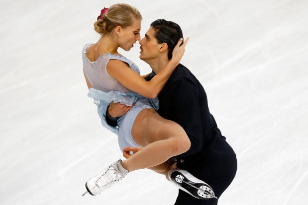 Piper Gilles and Paul Poirier of Canada compete in the Ice Dance Free Dance Program during the ISU figure skating France's Trophy at Bercy arena, in Paris, France, Saturday, Nov. 12, 2016. (AP Photo/Francois Mori)