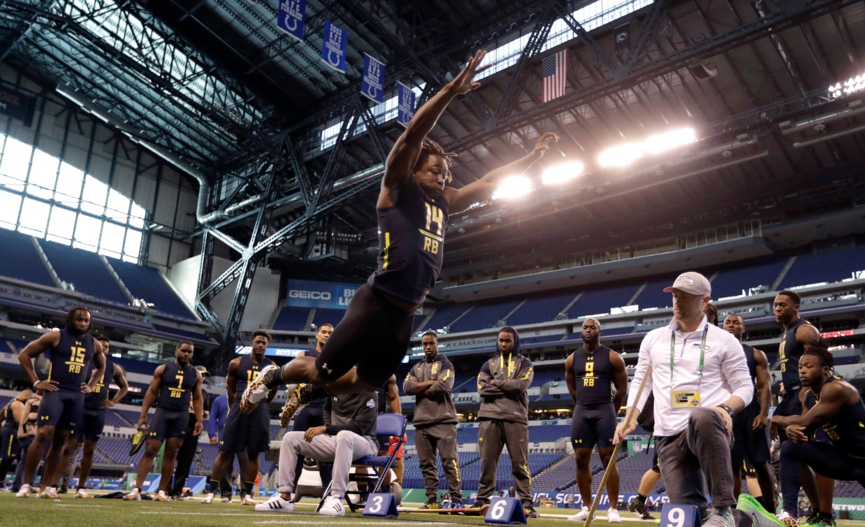 An athlete competes in the jump test at the NFL combine
