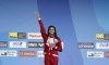 Masse breaks 100m backstroke world record to win world title