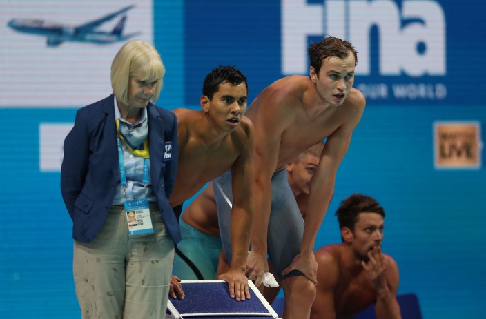 CAN Relay Bronze 4 Javier Acevedo and Yuri Kisil watch their teammates race in the mixed 4x100m freestyle relay at the 2017 FINA World Championships Photo: Swimming Canada/Ian MacNicol