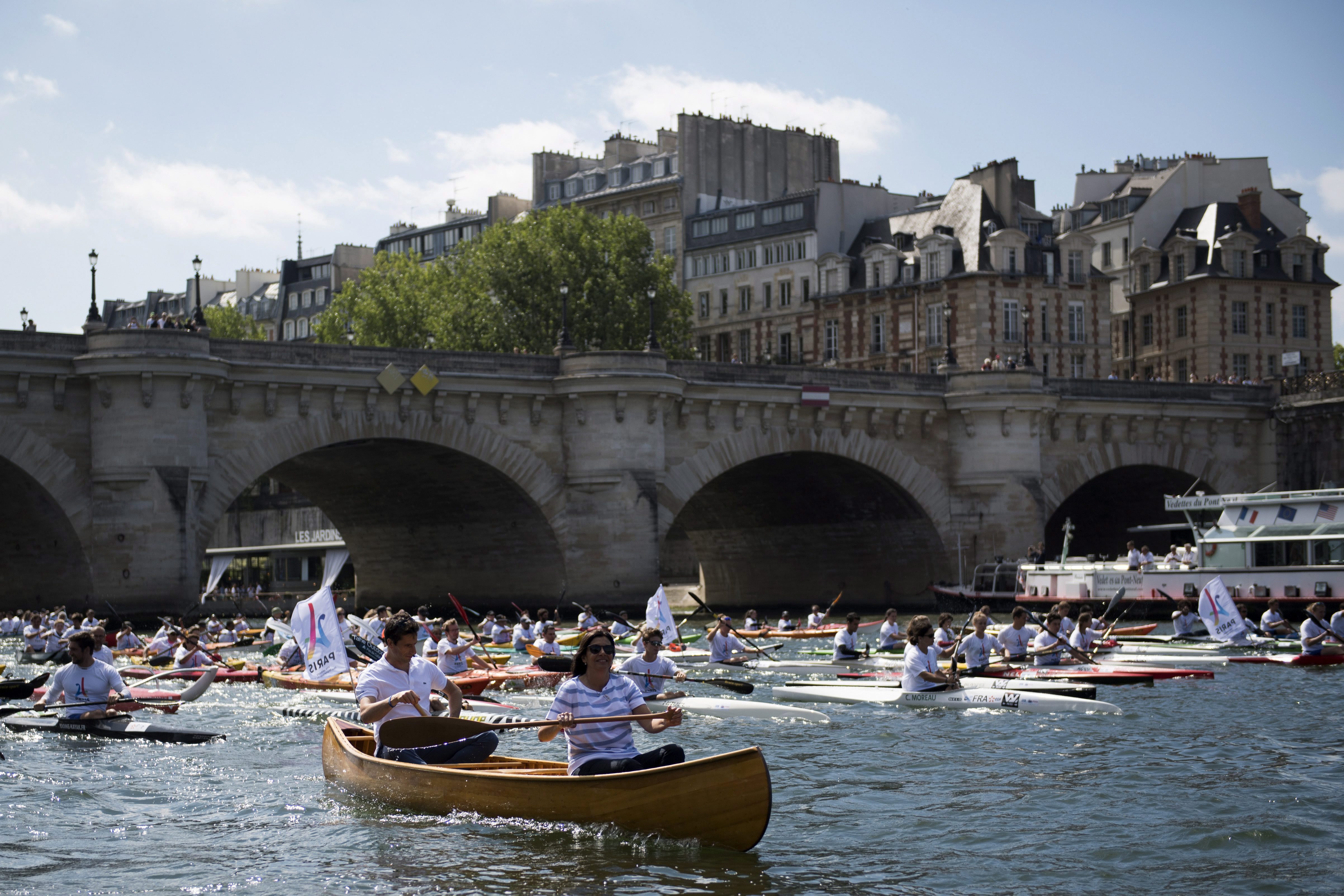 People paddling along the Seine river