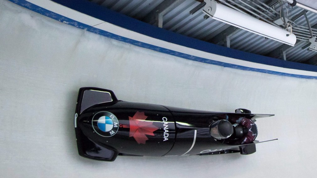 Alysia in a bobsleigh racing on the track