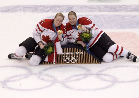 Haley Irwin, Cherie Piper Haley Irwin and teammate Cherie Piper pose with their gold medals