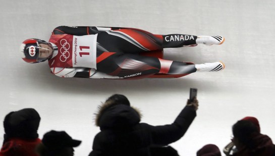 Alex Gough of Canada competes in her first run during the women's luge competition
