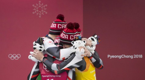 Canadian lugers Alex Gough, Sam Edney, Tristan Walker and Justin Snith celebrate their teams silver medal win during the team luge event at the Olympic Siding Centre during the Pyeongchang 2018 Winter Olympic Games in South Korea, Thursday, Feb. 15, 2018. THE CANADIAN PRESS/Jonathan Hayward