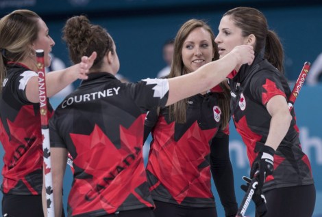 SUNDAY OLYMPIC REPEATS Canada's Emma Miskew, Joanne Courtney, skip Rachel Homan and Lisa Weagle, left to right, celebrate their victory over Switzerland in preliminary round in women's curling at the Pyeongchang 2018 Olympic Winter Games in Gangneung, South Korea, on Sunday, February 18, 2018. THE CANADIAN PRESS/Paul Chiasson
