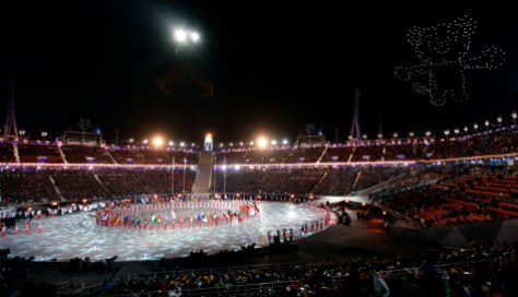 Pyeongchang Olympics Closing Ceremony Athletes march into the stadium as an Olympic mascot is illuminated in the sky during the closing ceremony of the 2018 Winter Olympics in Pyeongchang, South Korea, Sunday, Feb. 25, 2018. (AP Photo/Chris Carlson)