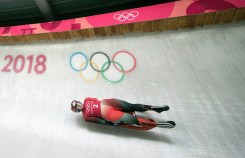Alex Gough drives into turn fourteen during luge training runs