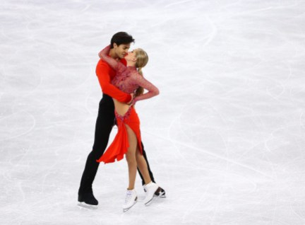 Team Canada Kaitlyn Weaver Andrew Poje PyeongChang 2018 short dance Kaitlyn Weaver and Andrew Poje of Canada compete in the Figure Skating Ice Dance Short Program at the Gangneung Ice Arena during the PyeongChang 2018 Olympic Winter Games in PyeongChang, South Korea on February 19, 2018. (Photo by Vaughn Ridley/COC)