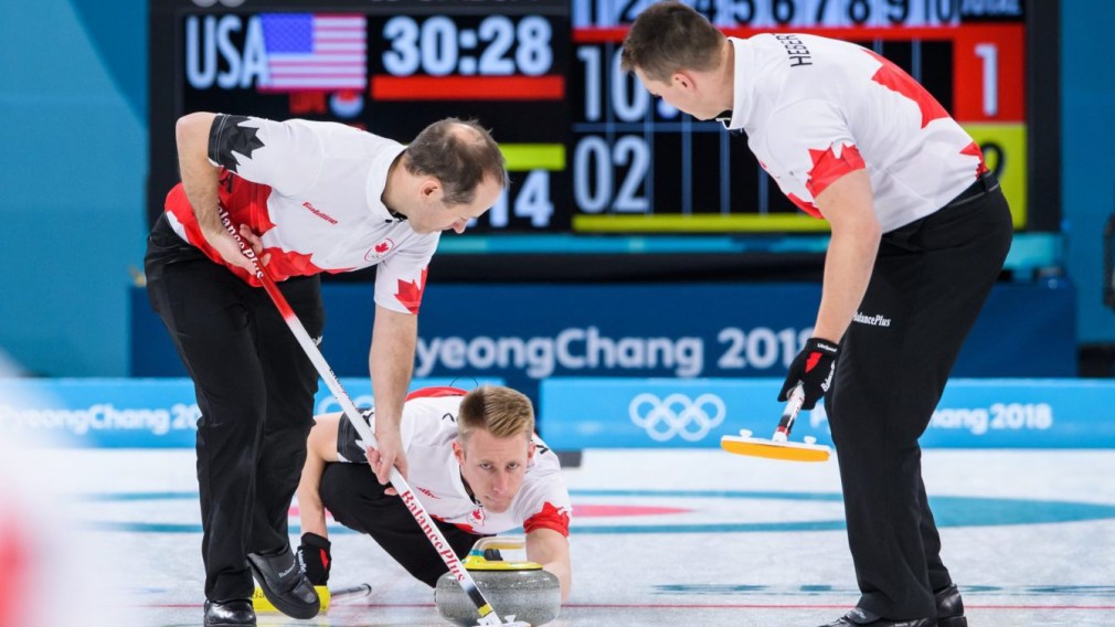 Canada curling team competing