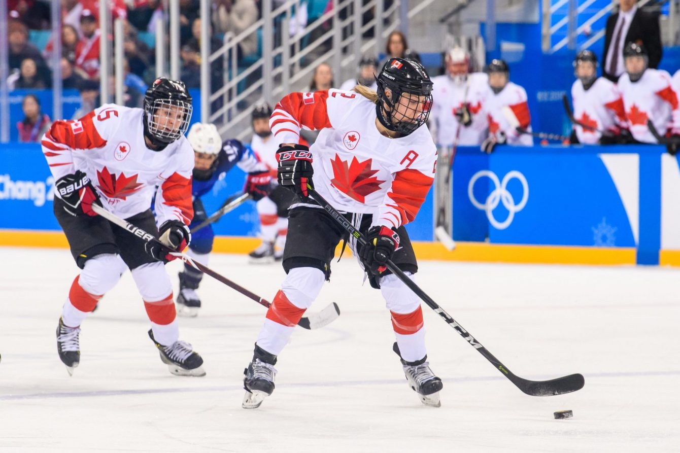 Megan Agosta stickhandling the puck