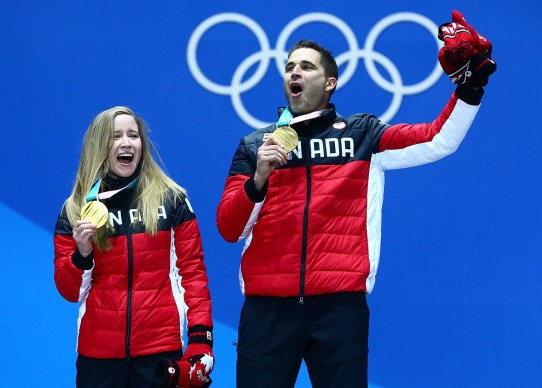 Kaitlyn Lawes and John Morris of Canada receive their Gold medal in Mixed Curling at the PyeongChang Olympic Plaza during the Pyeonchang Winter Olympics in Gangneung, South Korea on February 14, 2018. (Photo by Vaughn Ridley/COC)