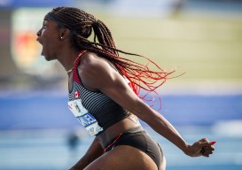 Crystal Emmanuel screams after a race