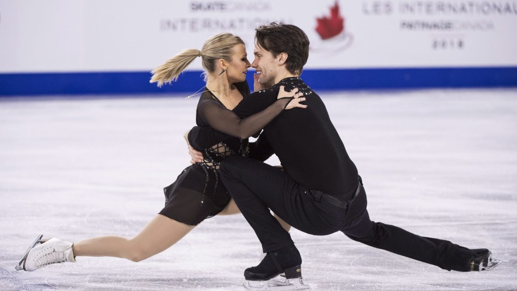 Kirsten Moore-Towers and Michael Marinaro perform a pair spin