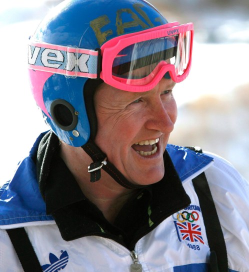 Former Olympic ski jumper Eddie "the Eagle" Edwards, from Britain, laughs after a ride from the 90 metre ski jump tower to commemorate the 20th anniversary start of the 1988 Olympics in Calgary, Alberta on Feb. 13, 2007. (THE CANADIAN PRESS/Larry MacDougal)