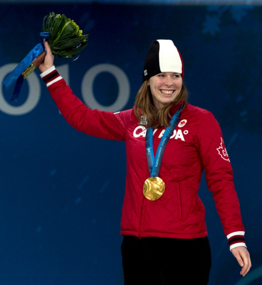 Christine Nesbitt Canadian speedskater Christine Nesbitt, from London, Ont., stands on the podium after receiving her gold medal for the women's long-track 1,000m competition during the medal ceremonies in Vancouver, BC Thursday Feb. 18, 2010. THE CANADIAN PRESS/Adrian Wyld