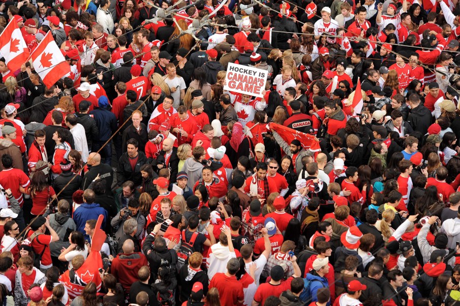 OLY HKO fans Thousands of jubilant Canadian hockey fans celebrate Canada's 3 -2 overtime gold medal hockey victory at the corner of Robson and Granville Streets in downtown Vancouver Sunday, Feb.28, 2010 at the 2010 Olympic Winter Games in Vancouver.THE CANADIAN PRESS/Scott Gardner