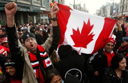 Team Canada fans Vancouver 2010 (3) Canadian fans celebrate their gold medal victory against the United States in the final hockey match at the Vancouver 2010 Olympics, in downtown Vancouver, British Columbia, Sunday, Feb. 28, 2010. (AP Photo/Chris Carlson)