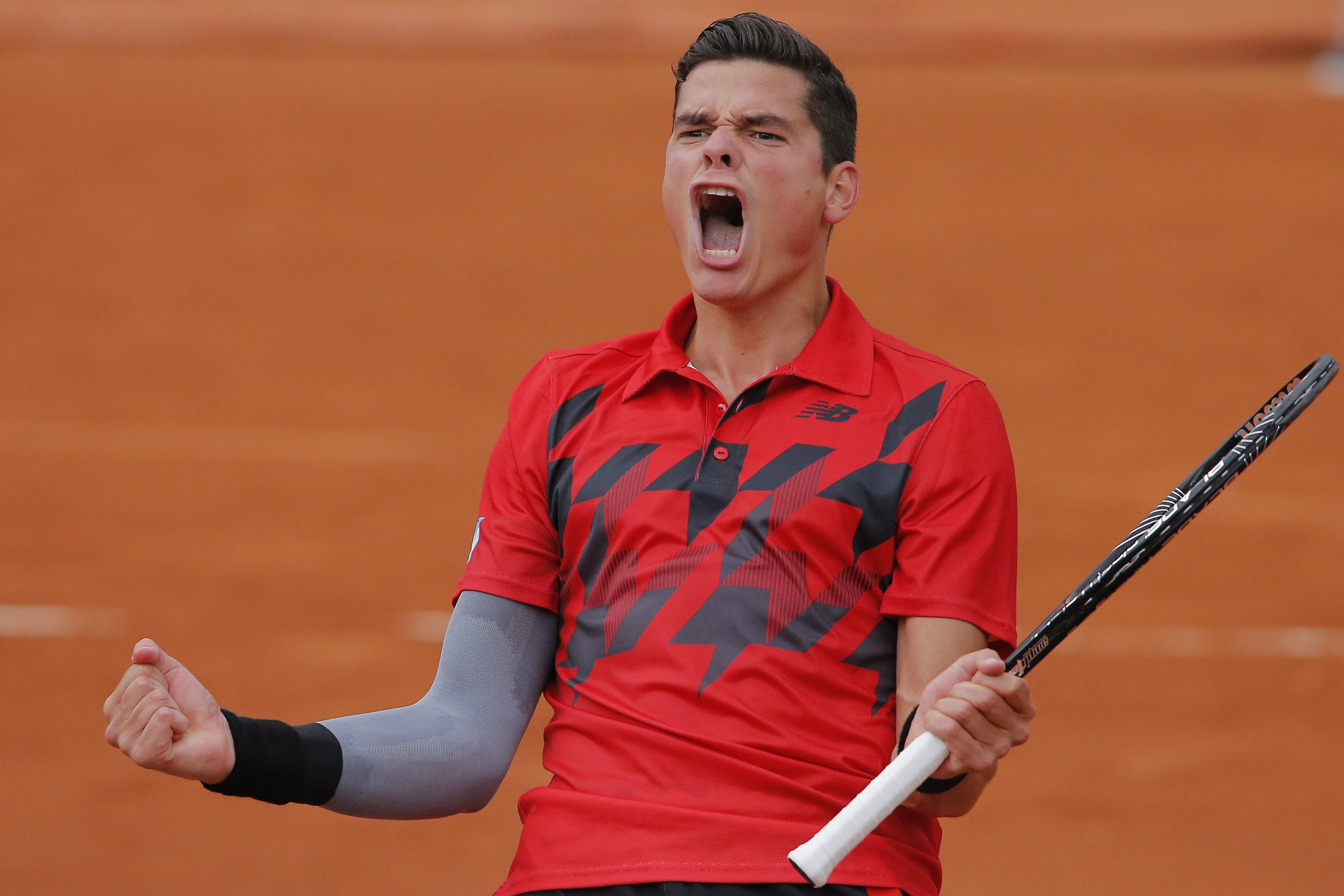 Milos Raonic celebrates
