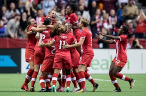 Women's soccer team celebrating