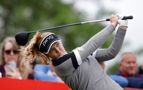 Brooke Henderson hits a tee shot