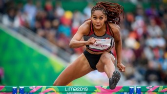 Keira Christie-Galloway leaps over a hurdle