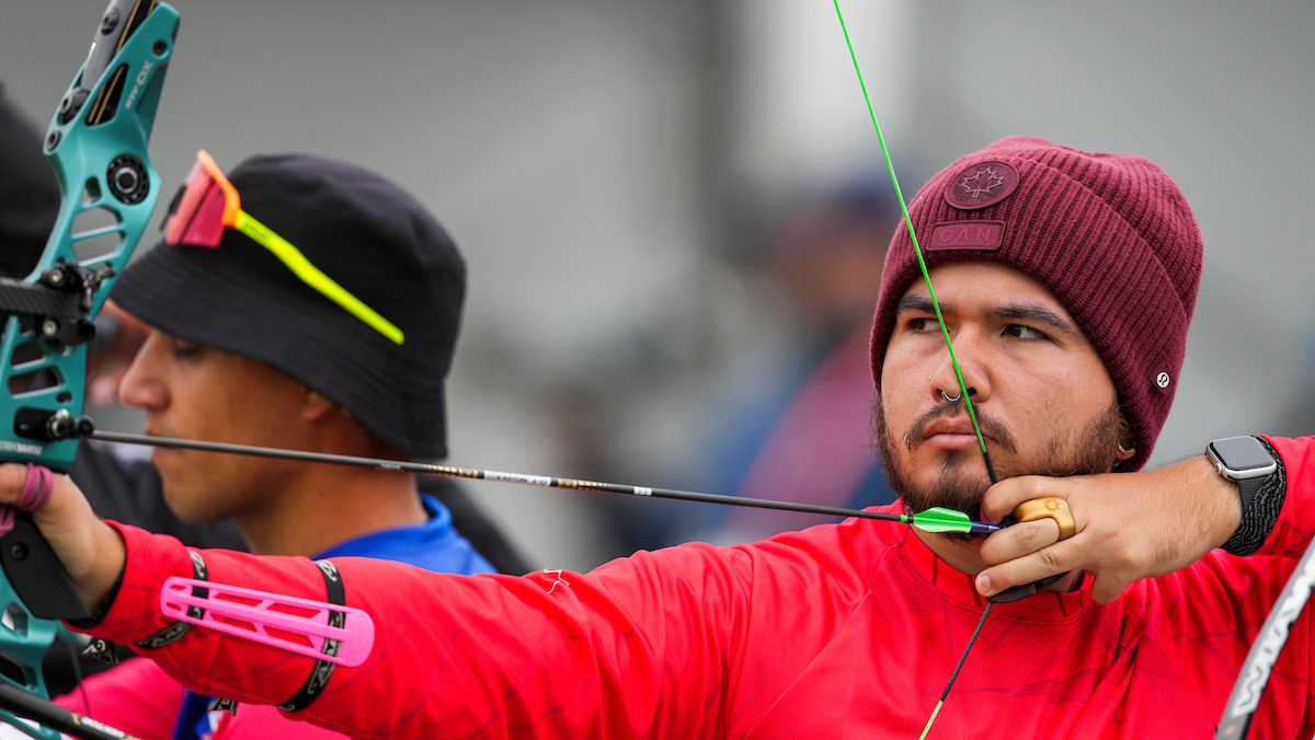 Eric Peters takes aim with his bow