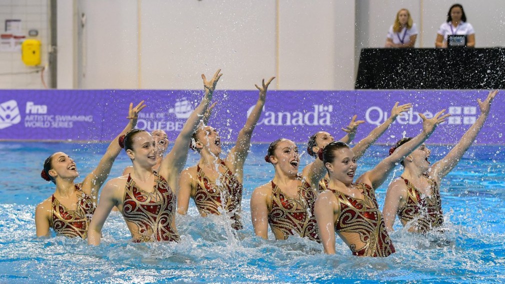 Synchronized swimming team in the water