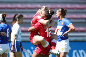 Rugby players hugging