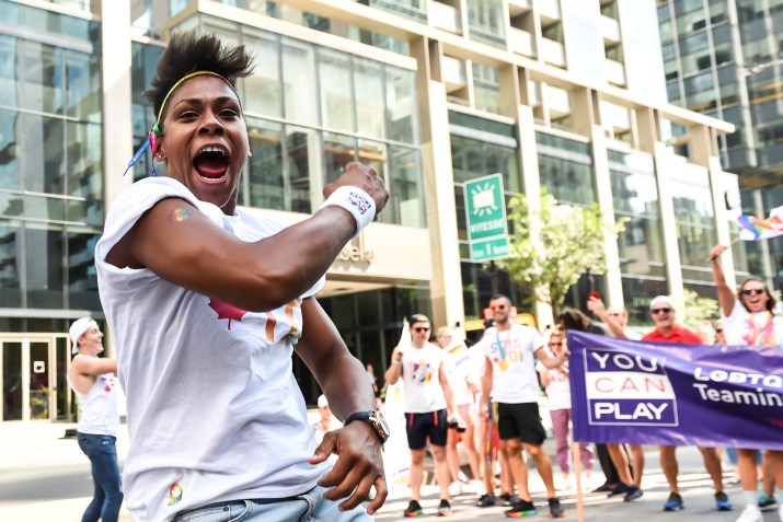 Krystina Alogbo celebrates during the Montreal Pride Parade in 2018.