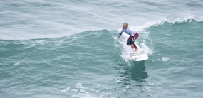 TeamCanadaMathea OlinSurfingLima Mathea Olin riding the wave
