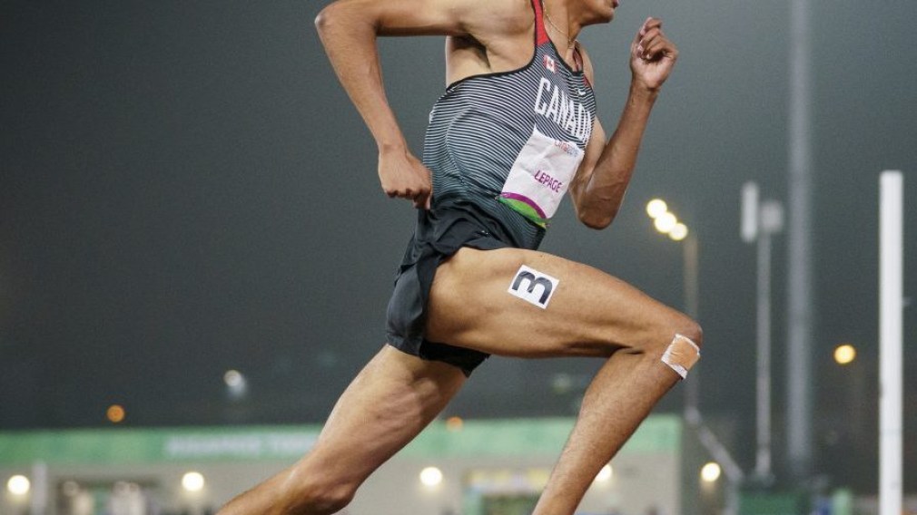 Pierce Lepage of Canada competes in the 400m race during the decathlon