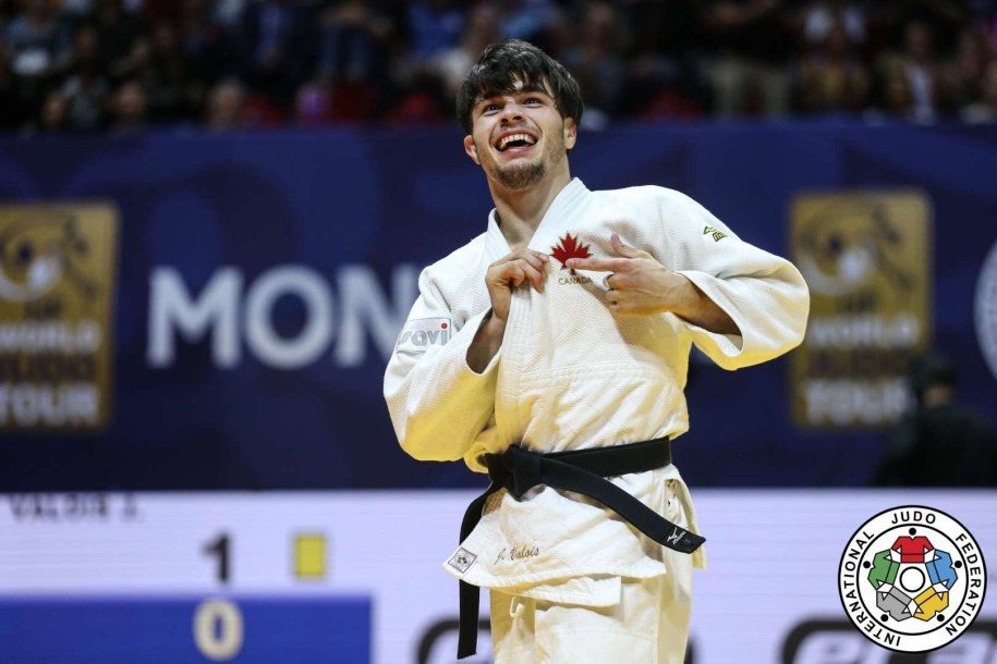 Jacob Valois celebrates a victory over Australia's Nathan Katz at the 2019 Montreal Grand Prix.