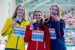 Minna Atherton, Kylie Masse, Olivia Smoliga, posing after the women's 100m backstroke final
