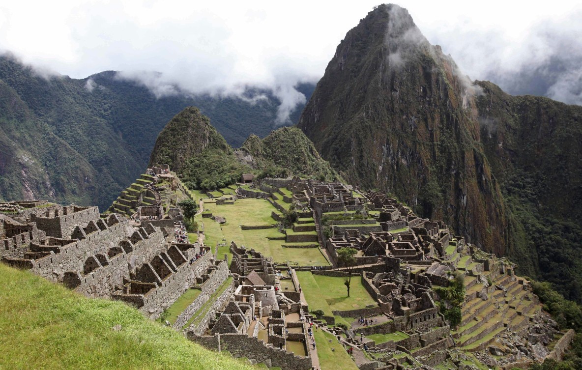 Machu Picchu site showing the mountains and old city ruins